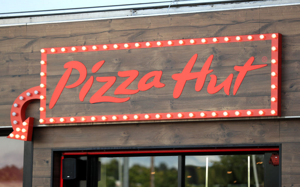 pizza hut was the first pizza space delivery