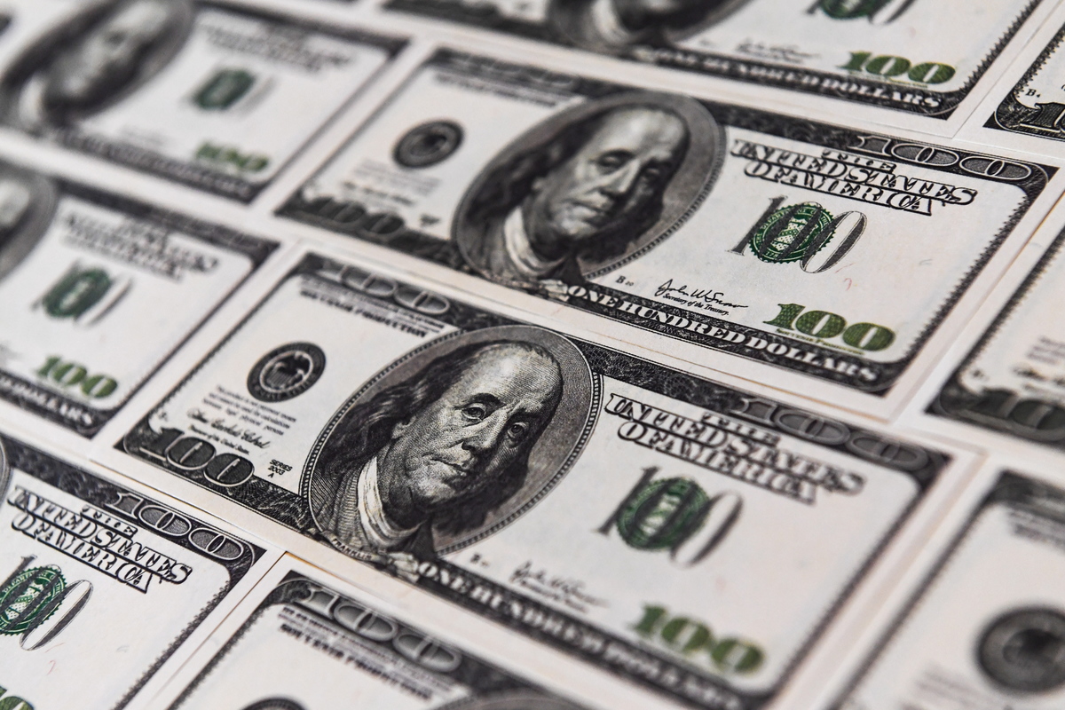 Money US dollar banknotes fear of wealth phobia plutophobia