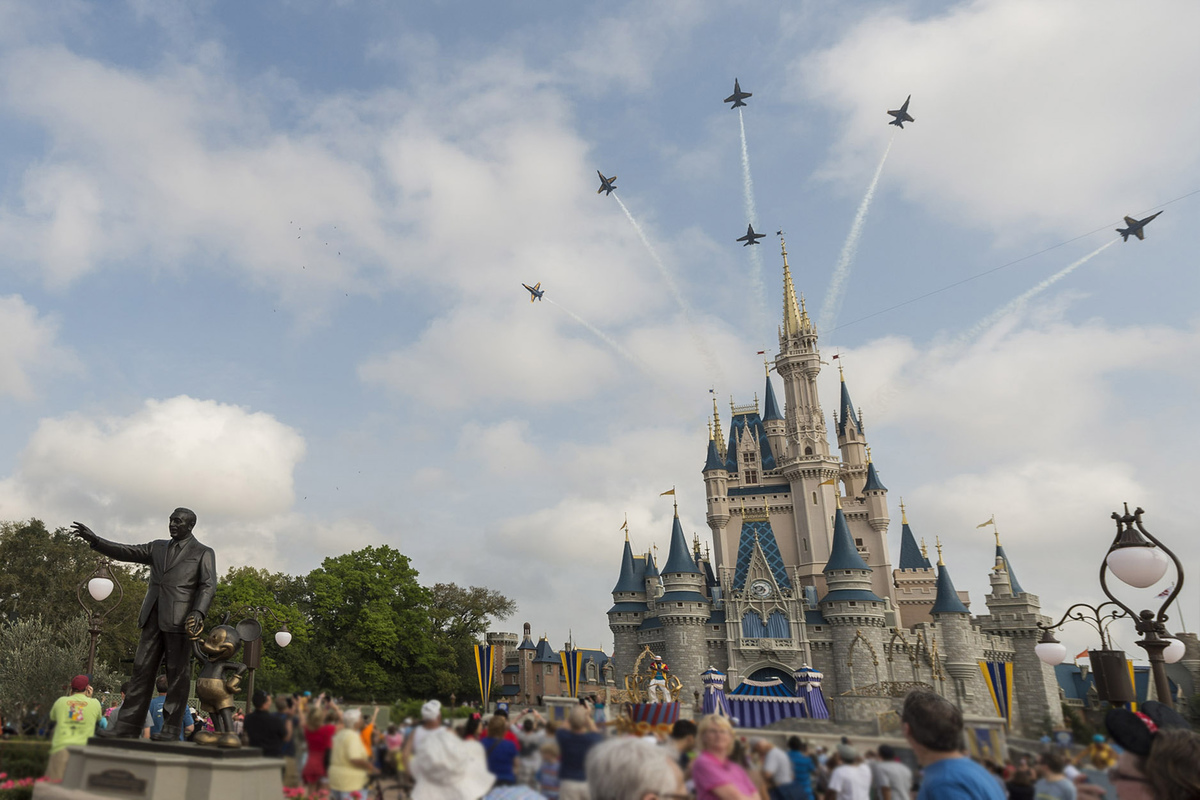 U.S. Navy Blue Angels Soar Above Cinderella Castle At Walt Disney World Resort