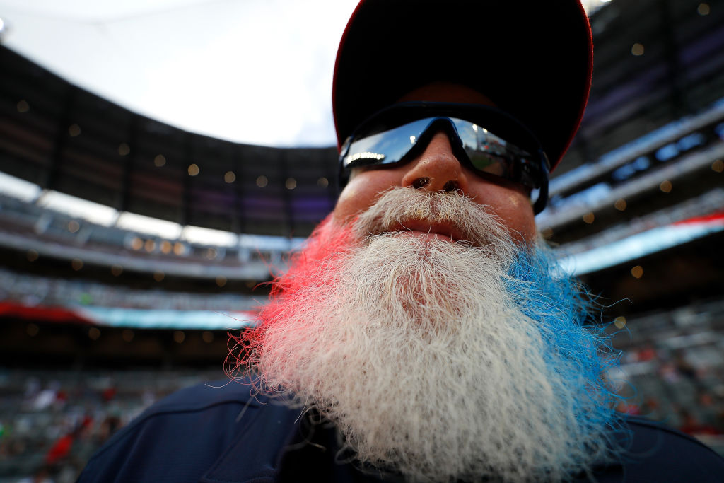 GettyImages-1160115925 Grounds crew assistant Mike Bradberry shows off his beard as he celebrates the Fourth of July