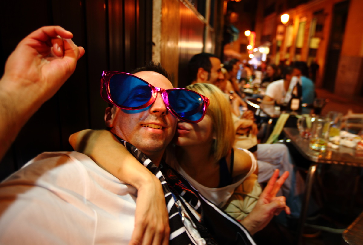 Tourists and local people meet near Plaza Mayor, the famous central market place which dates back to the 15th century, in Madrid on May 25, 2010 in Madrid, Spain.