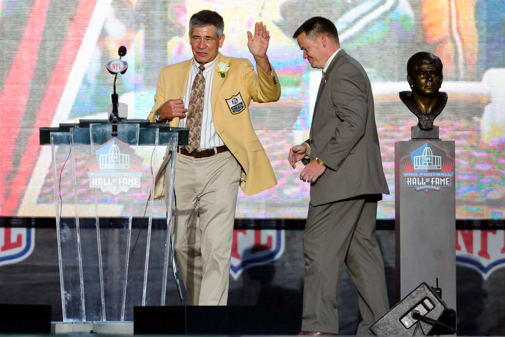 CANTON, OH - AUGUST 6: Former Washington Redskins linebacker Chris Hanburger waves to the fans after the unveiling of his bust at the Enshrinement Ceremony for the Pro Football Hall of Fame on August 6, 2011 in Canton, Ohio. 