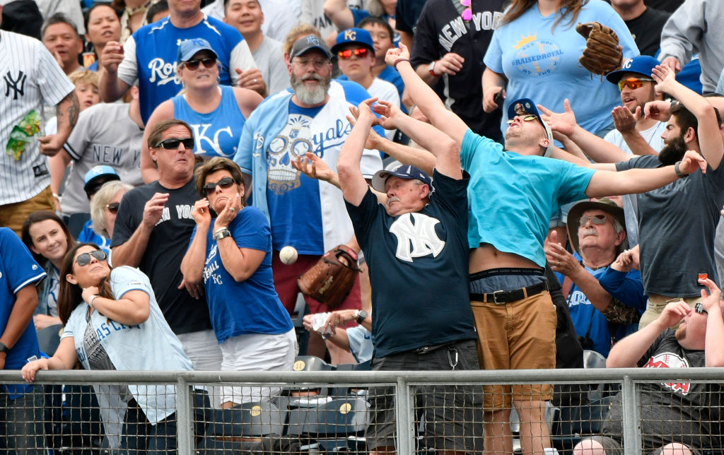 Men trying to catch a ball 