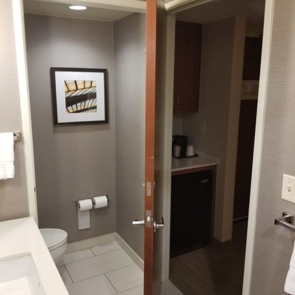 multipurpose door in hotel bathroom