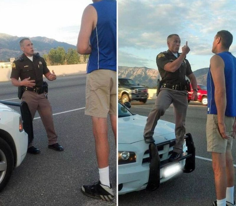 small cop arresting big man
