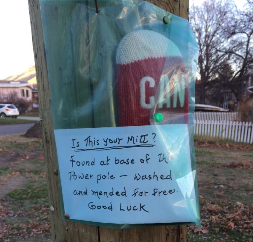 Mitten in bag with note saying the person found it, washed it, and mended it after finding it on the street