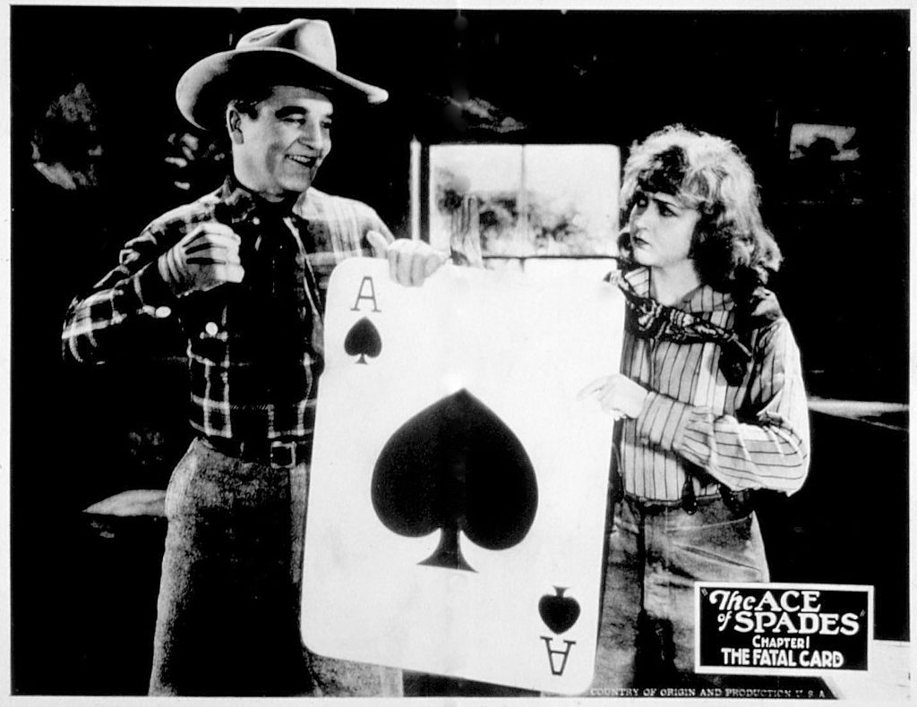 an ace of spades card in a movie poster