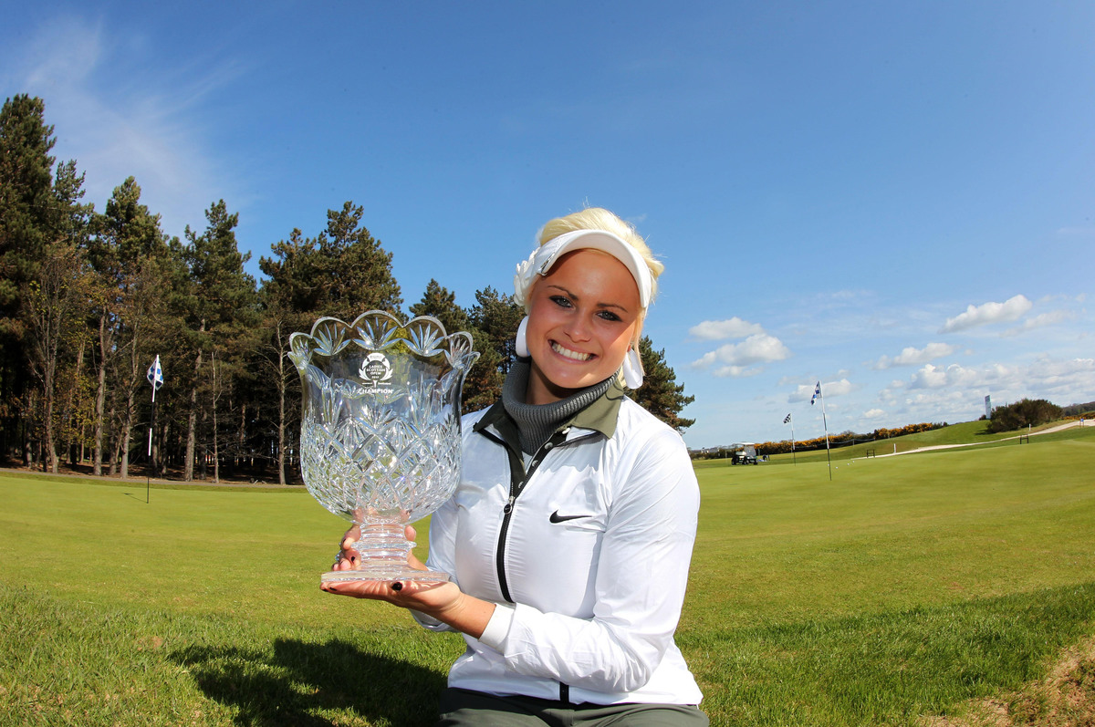 Scotland's Carly Booth celebrates winning the Asset Management Ladies Scottish Open at Archerfield Links Golf Course.