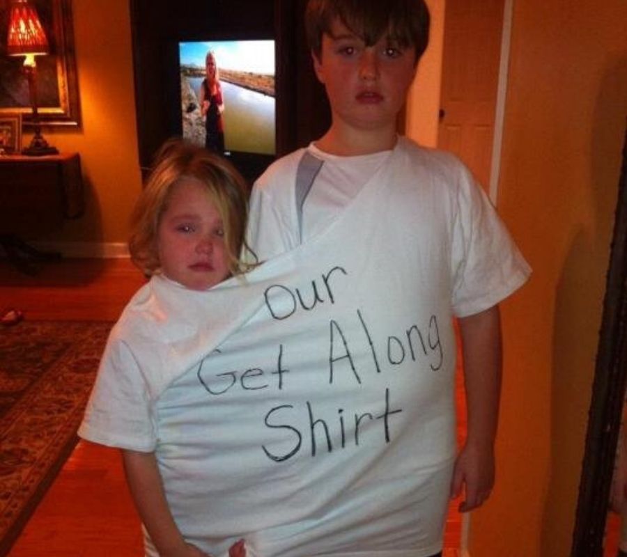 two kids in one shirt that says 'our get along shirt'