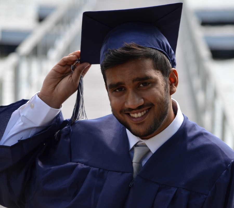 guy wearing a graduation cap
