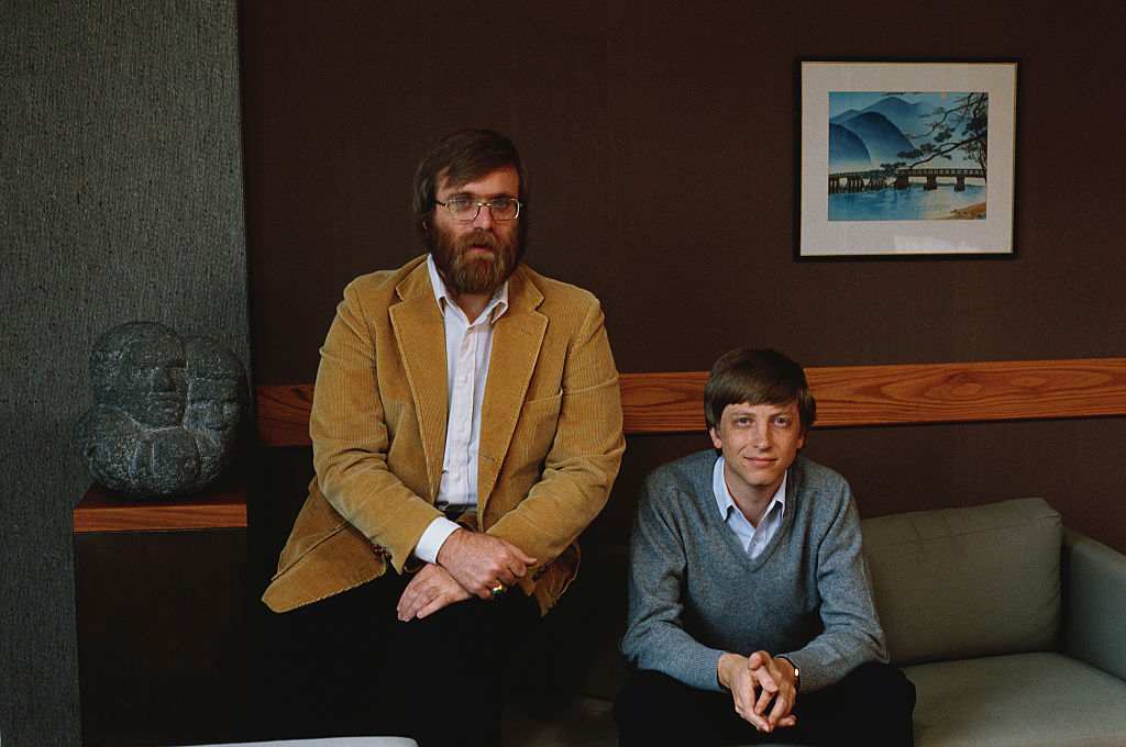microsoft co-founders paul allen and bill gates posing for a portrait in 1984