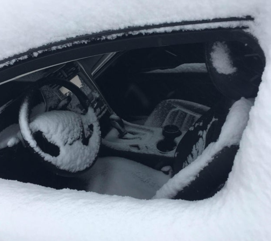 someone left their window open that allowed snow in the car