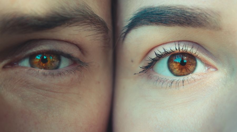 close up of two people's eyes