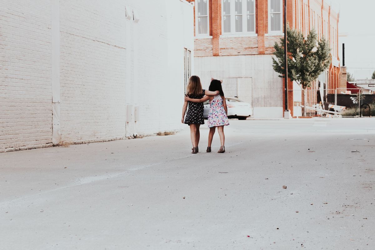two young girls walking together