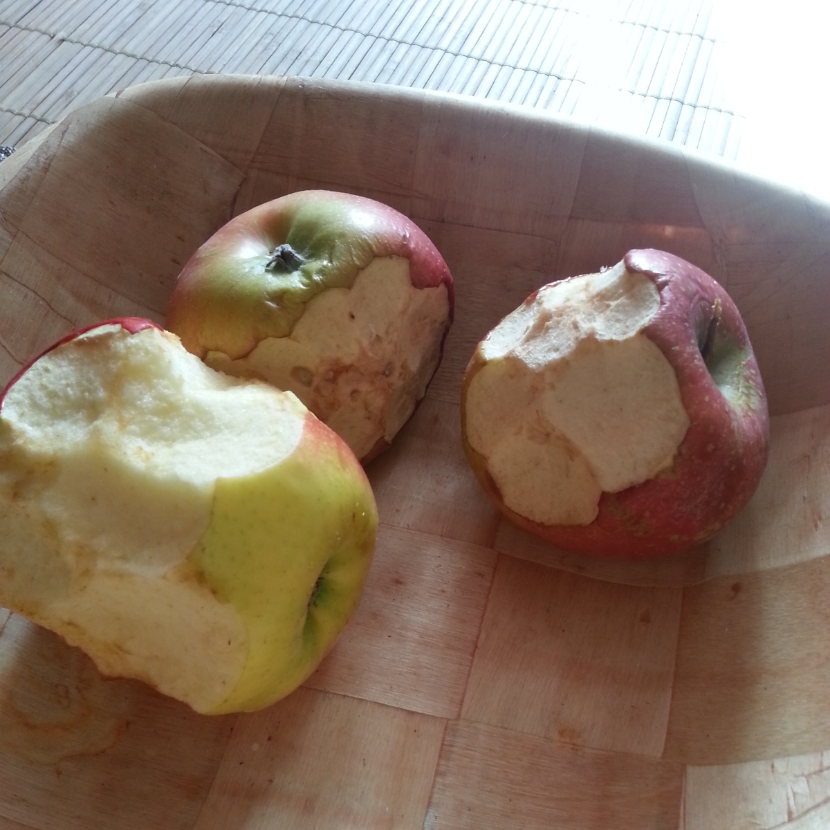 bitten apples by a sibling