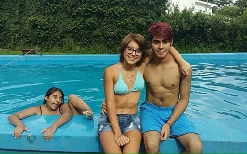 pool photobomb of a sibling