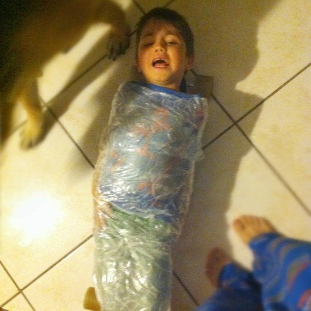 nephew taped to the skateboard