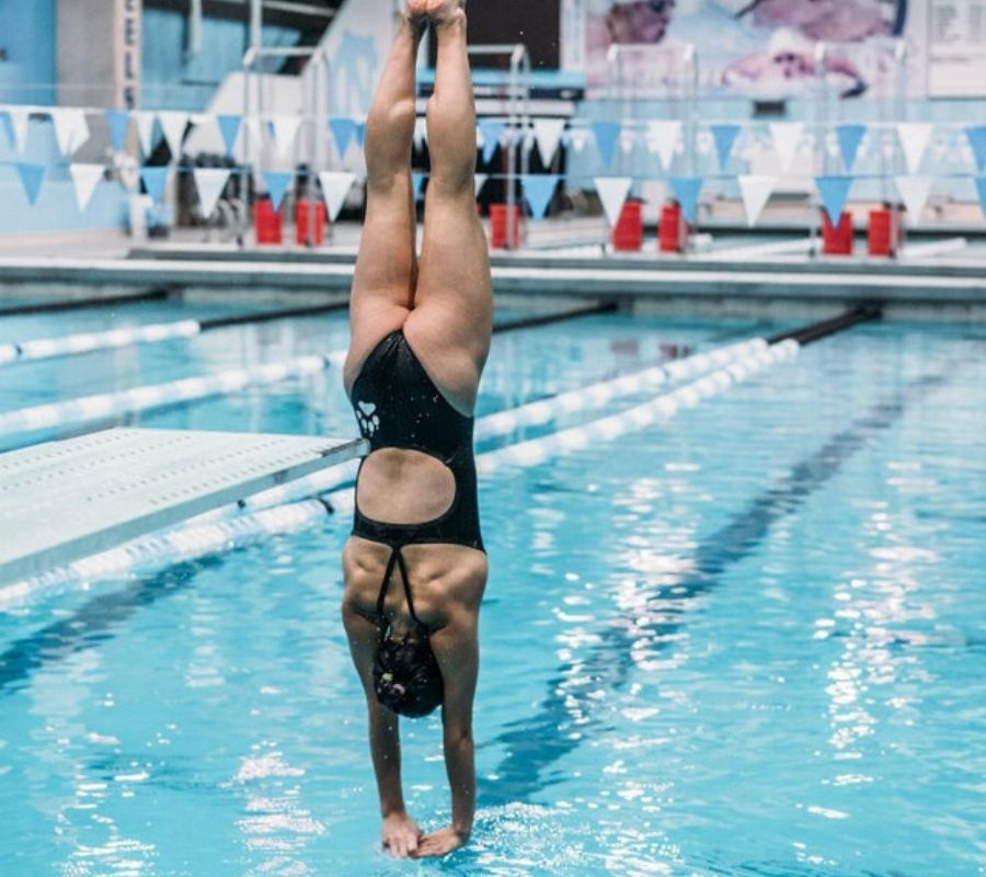 a picture of a woman diving