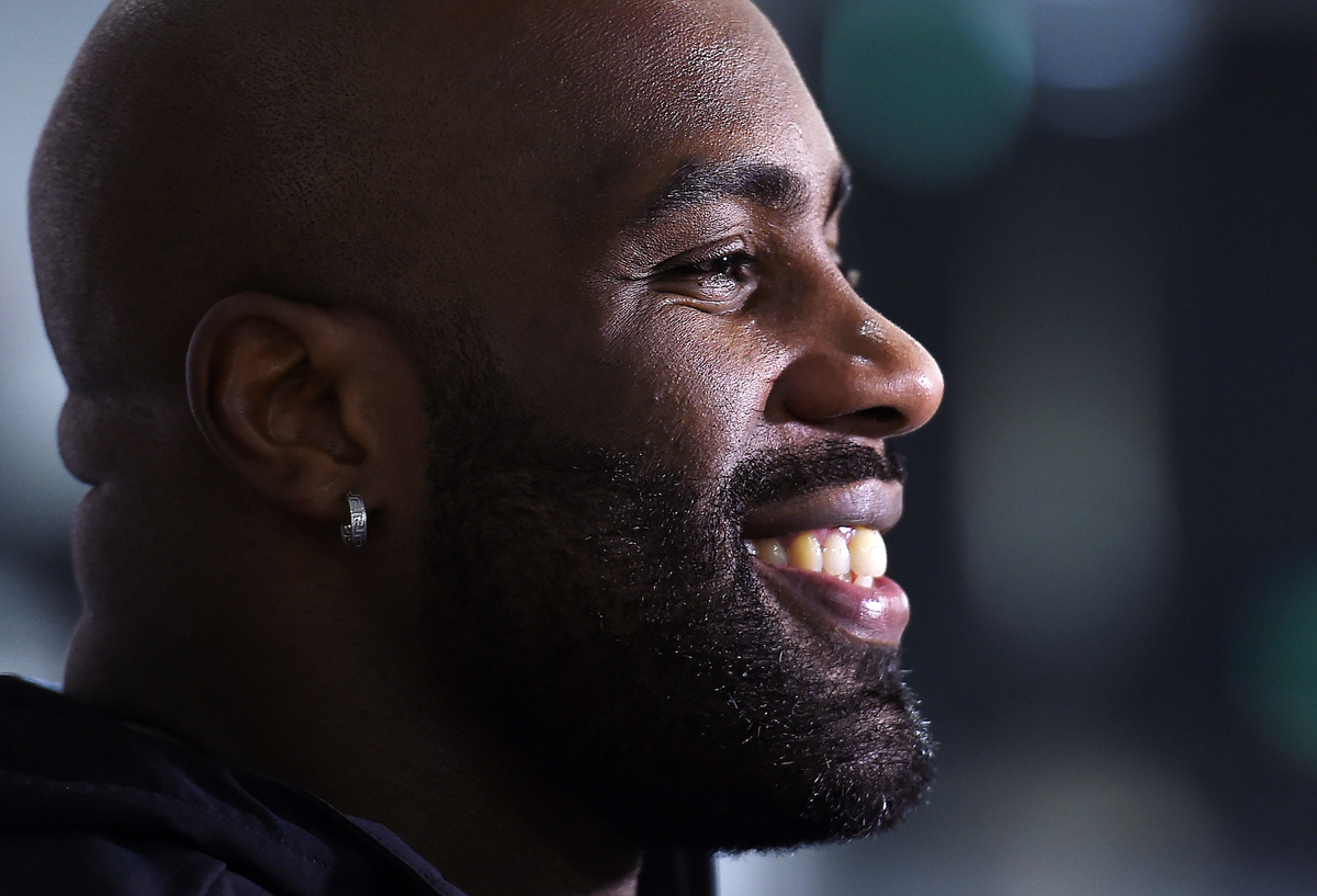 French judo legend Teddy Riner smiles during an interview.