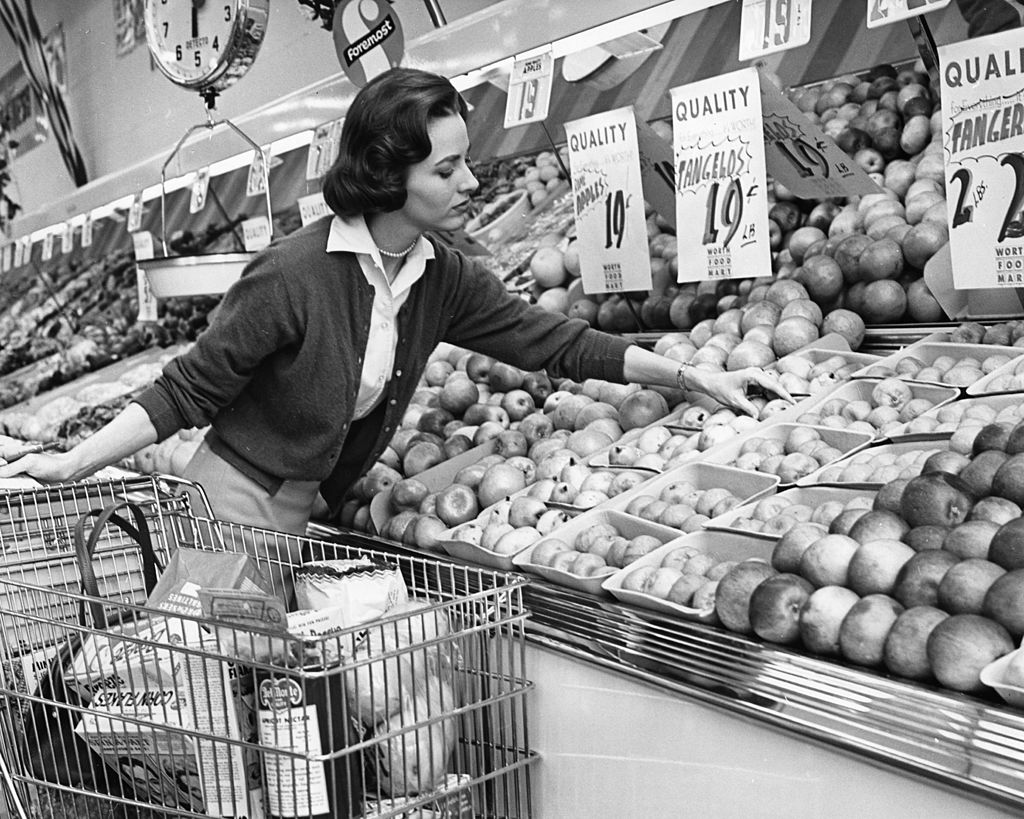 Woman picking out produce