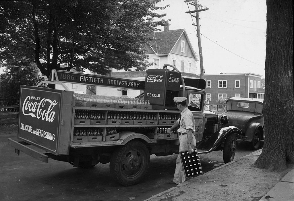 Man with glass bottles