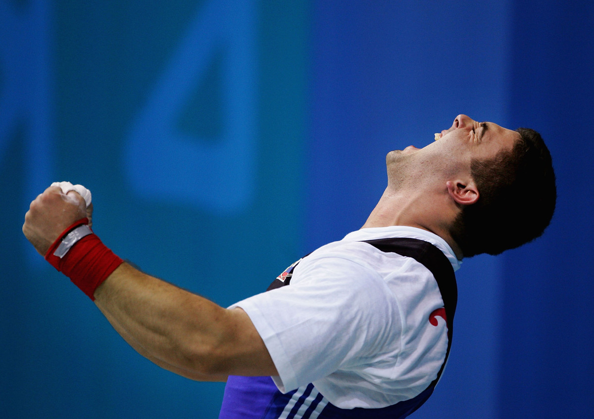 Gold medal winner Dmitry Berestov of Russia celebrates winning the gold medal.