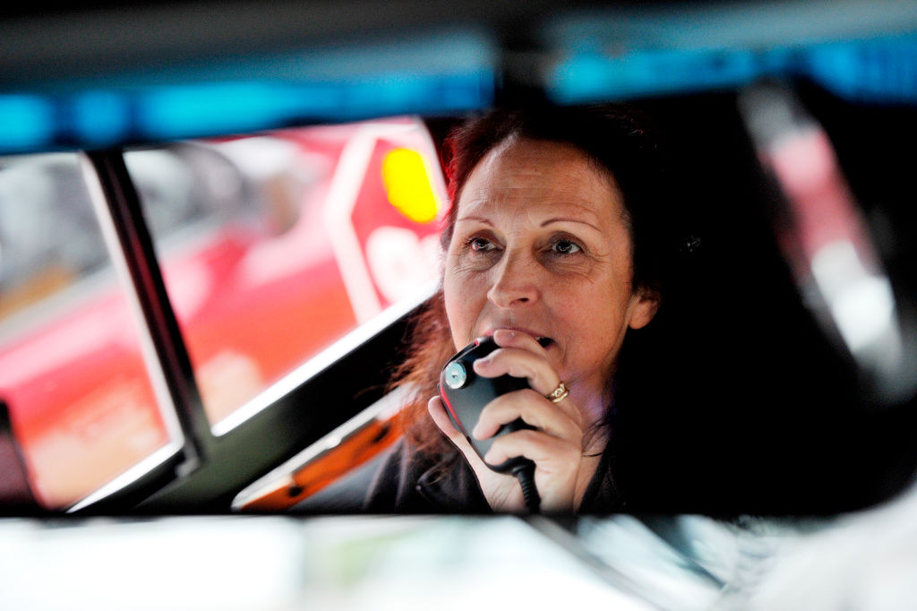a school bus driver giving instructions