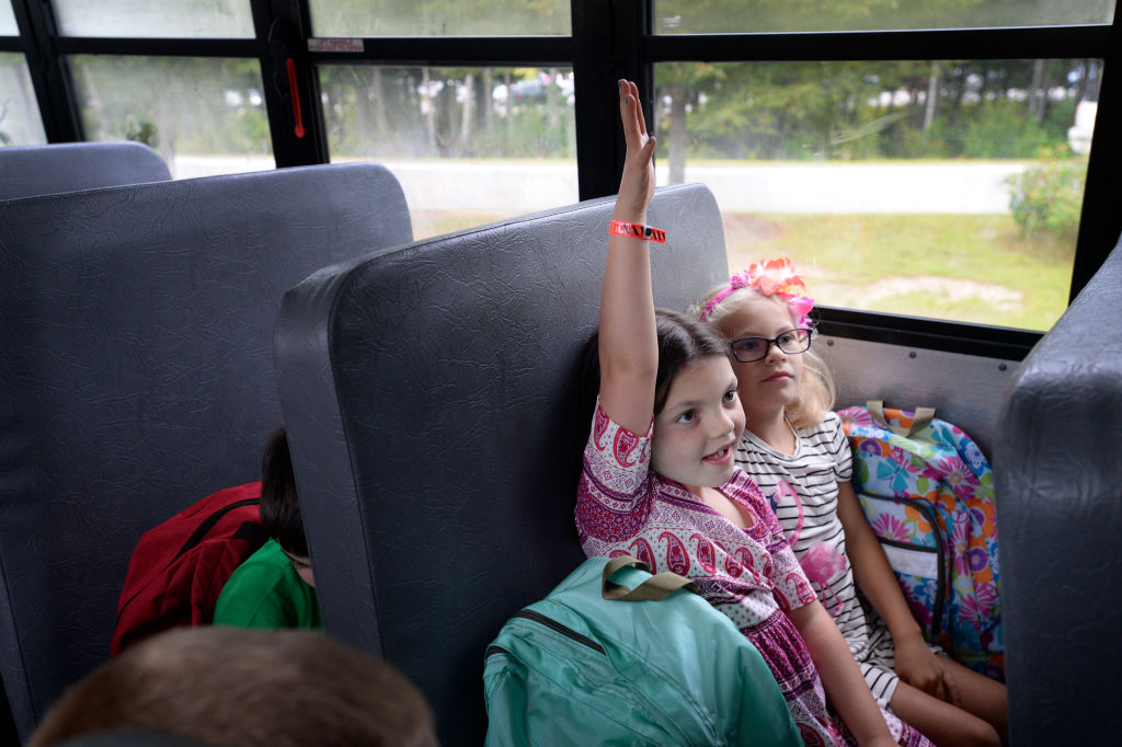 kids on a school bus