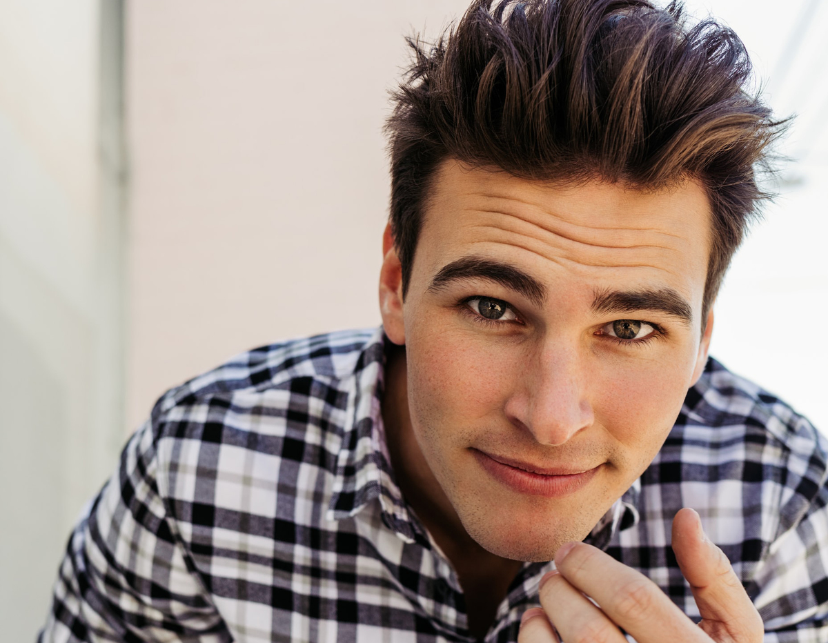 Troy Osterberg shows off his brown eyes.
