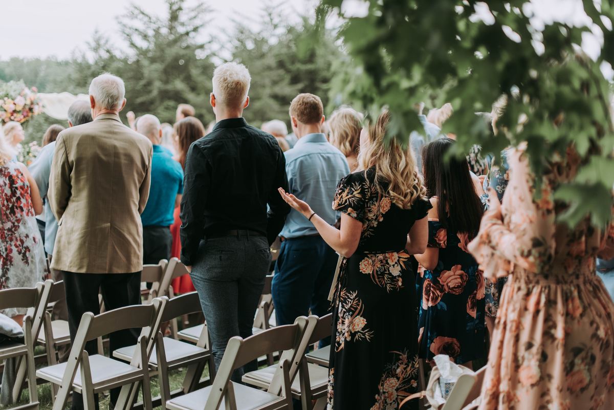 guests standing at a wedding