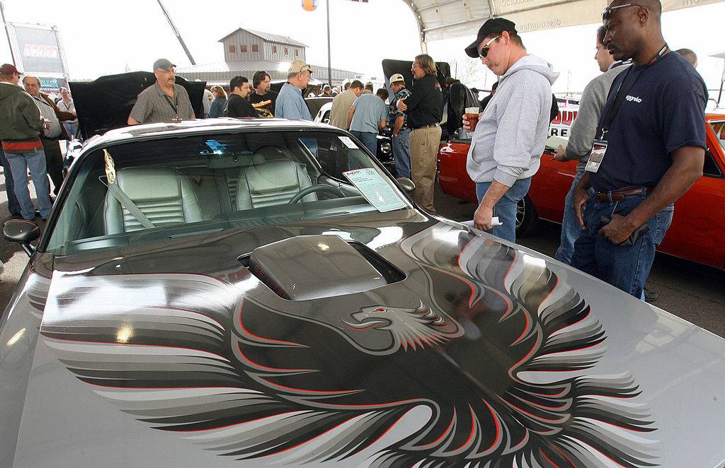 inspecting a car at auction