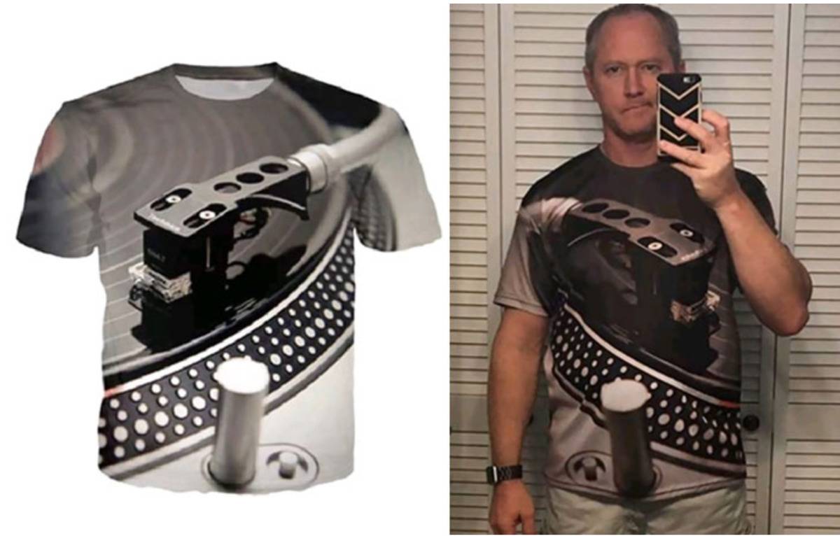 shirt with record player patter has tall button located in bad location for wearing