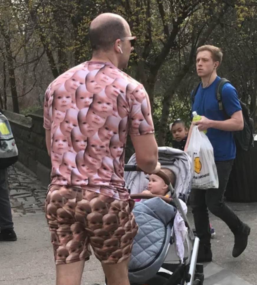 man wears shirt and shorts covered in pattern made up of his baby's face