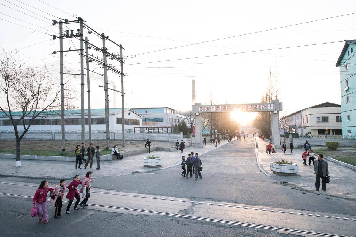 kids playing in the street in pyongyang, north korea