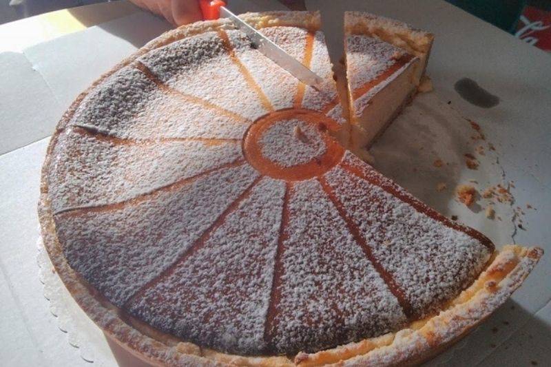 someone not cutting a cake right