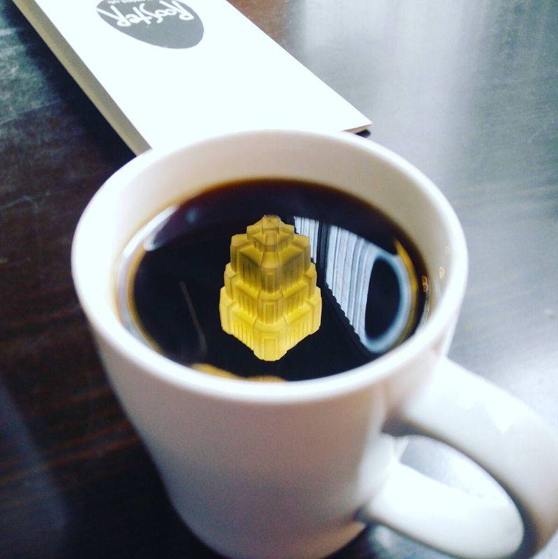 light reflected in coffee looks like a castle