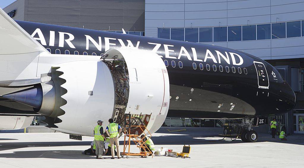 Crews work on the engine of an Air New Zealand Boeing 787-9 Dreamliner
