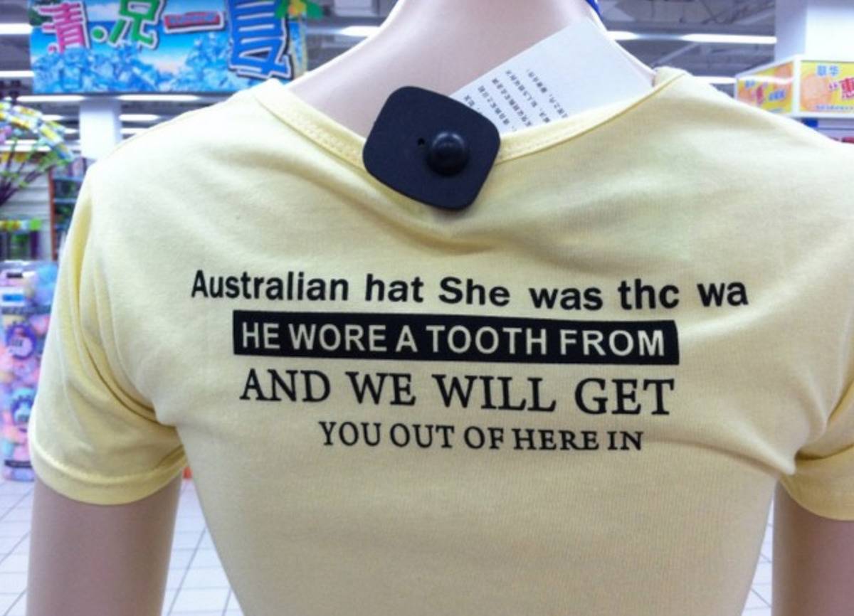 writing on the back of the shirt makes no sense (australian hat she was thc was HE WORE A TOOTH FROM AND WE WILL GET YOU OUT OF HERE IN)