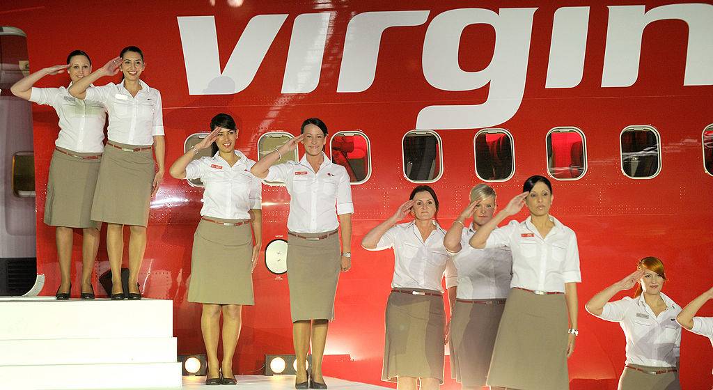 flight attendants salute during celebrations