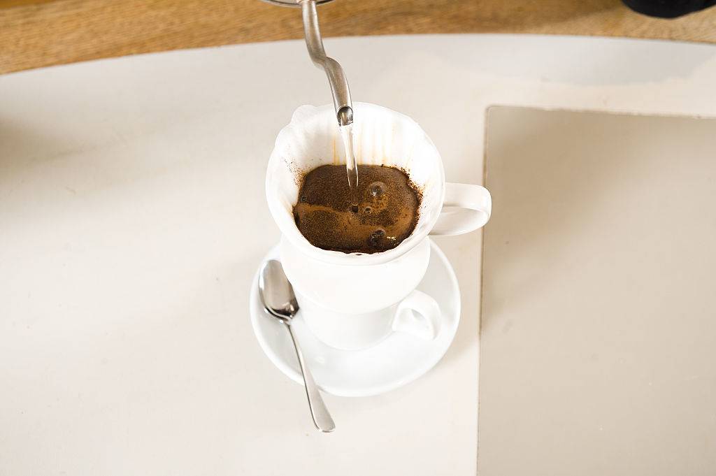 coffee and water inside a coffee filter