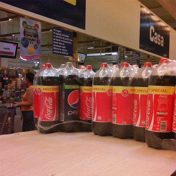 a Pepsi hiding in a coke bottle
