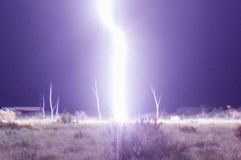 forks of lighting coming out of the ground
