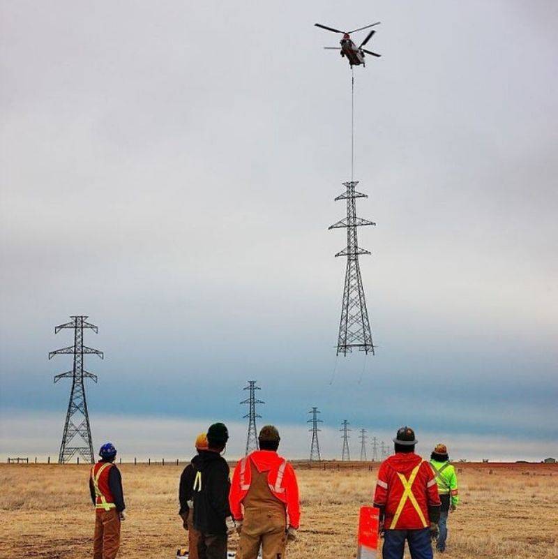 people putting in power lines