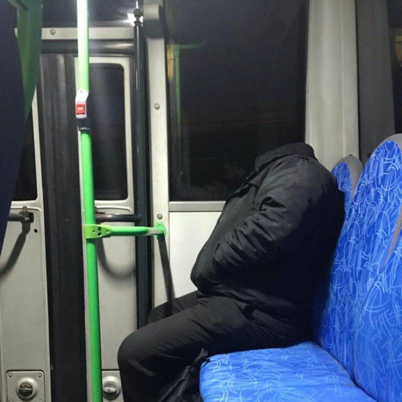 a guy wearing a hoodie looks like he has no head