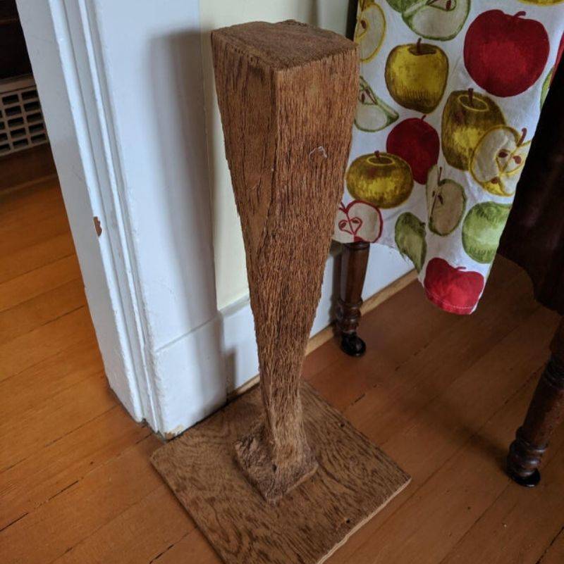 a cat scratching post that's been super used