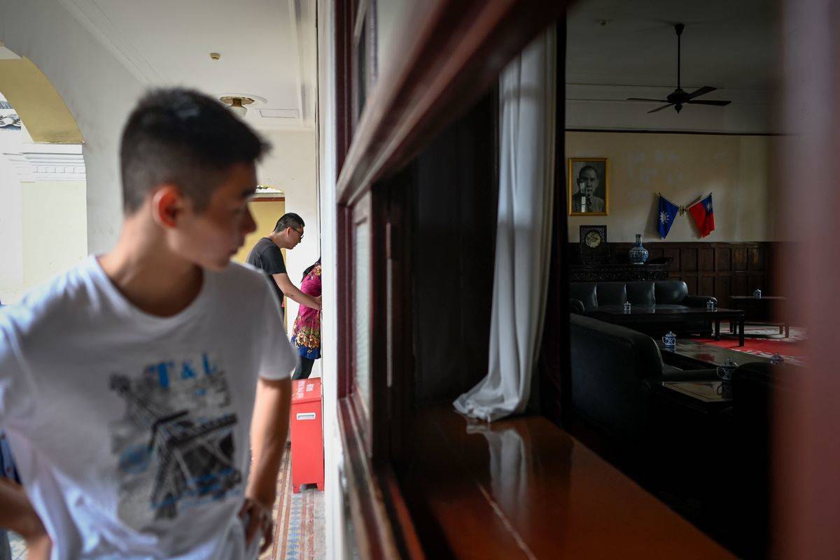 man walking in museum