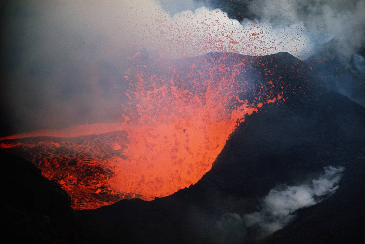 Red hot lava spews from an erupting volcano on Surtsey,