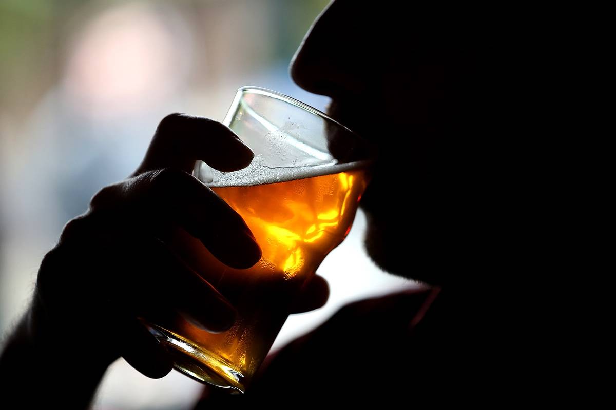 person drinking beer
