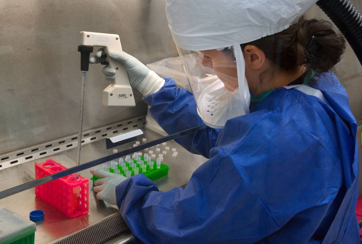 Centers for Disease Control (CDC) scientist was using a pipette