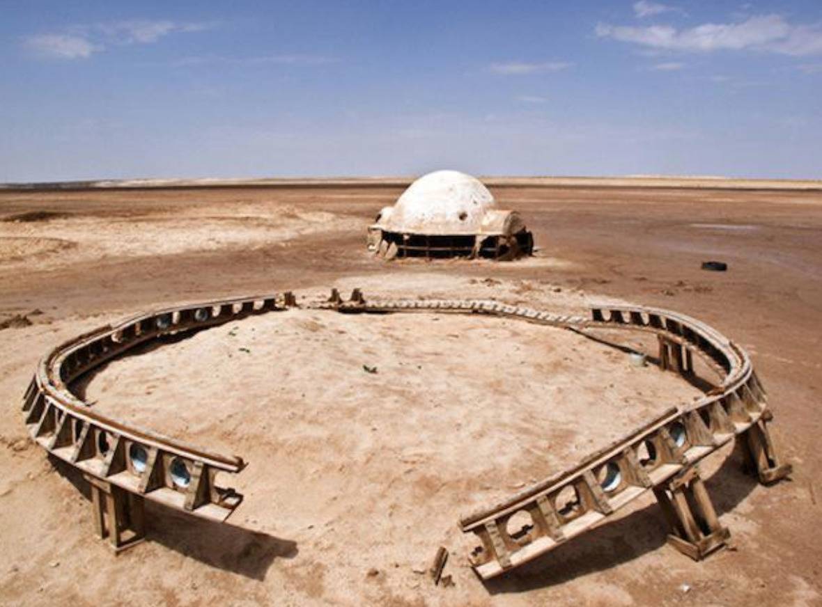 metal work on the ground in the desert
